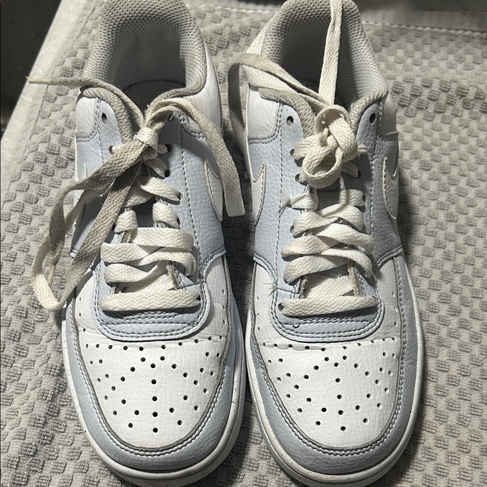 Girls blue and white Nike low top sneakers